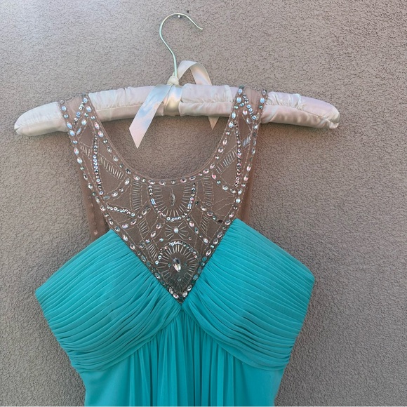 Beautiful long dress
In Aqua blue. - Picture 2 of 7